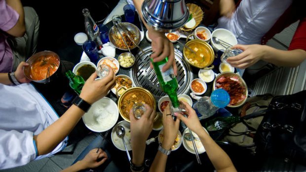 Eat up: a barbecue at a Korean restaurant.