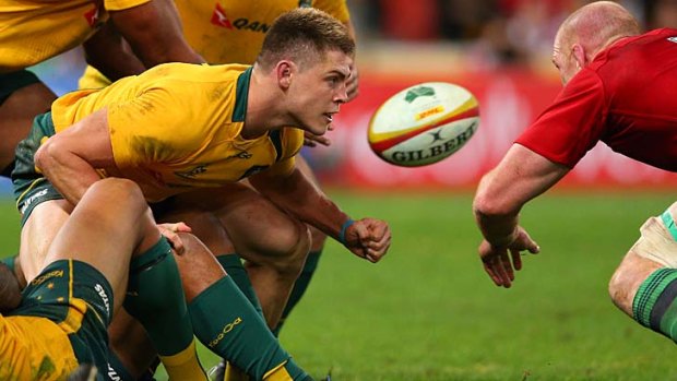 Brave: James O'Connor of the Wallabies protects a maul against the Lions.