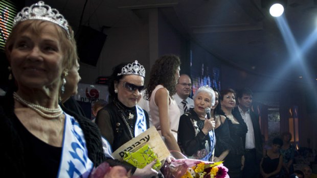 Hava Hershkovitz, third from right, speaks to the crowd after her win.