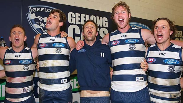 In fine voice: Joel Selwood, Tom Hawkins, Joel Corey, Dawson Simpson and Mitch Duncan belt out the song in the rooms after defeating Hawthorn for the 11th straight time.