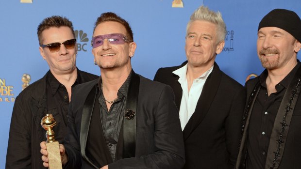 Expect some delays ... Larry Mullen Jr., Bono, Adam Clayton and The Edge are planning to tour next year. 