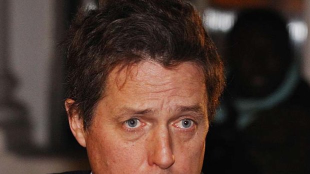 Hitting out ... actor Hugh Grant.