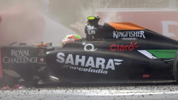 Perez's car slams into the tyre barrier.
