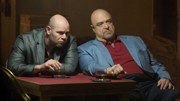 Los Angeles underworld: Big Ernie (Domenick Lombardozzi, left) and Frank (John Goodman) in <em>The Gambler</em>.