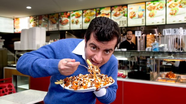 Senator Sam Dastyari shows how to make a halal snack pack. 