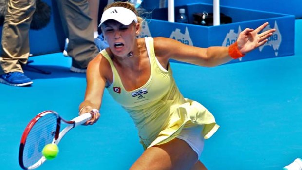 Stretched &#8230; Caroline Wozniacki beat Dominika Cibulkova.