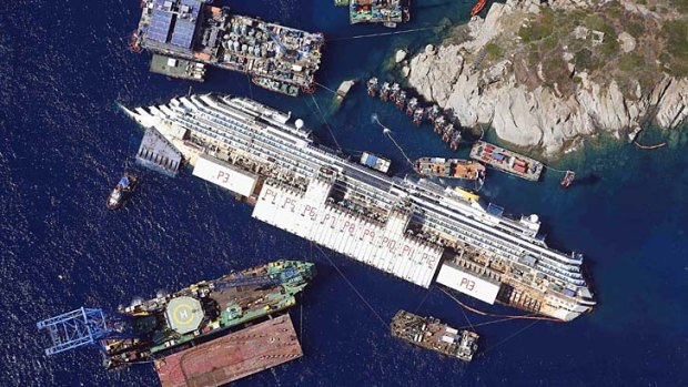 Stricken liner: An aerial view of the wrecked Costa Concordia as it lies on its side off the Tuscan island of Giglio.