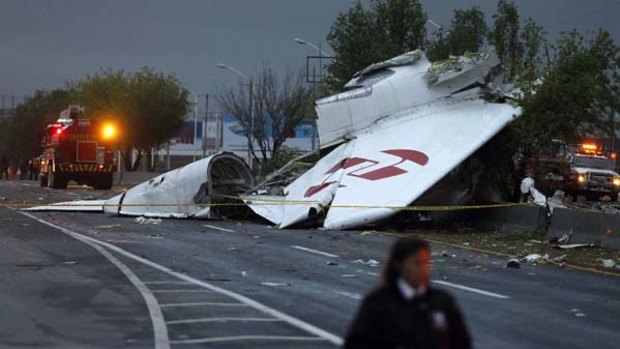 Six dead ... a plane crashed as it was about to land in Monterrey.