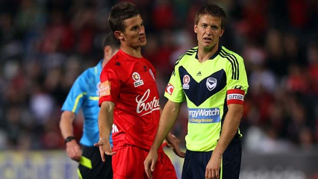 On his way: Victory's Adrian Leijer is sent off in Adelaide last night.