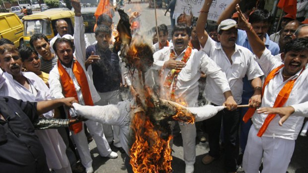 Activists of Shiv Sena, a Hindu hardline group, burn an effigy of Australian Prime Minister Kevin Rudd in New Delhi during a protest against the recent attacks on Indian students in Australia.
