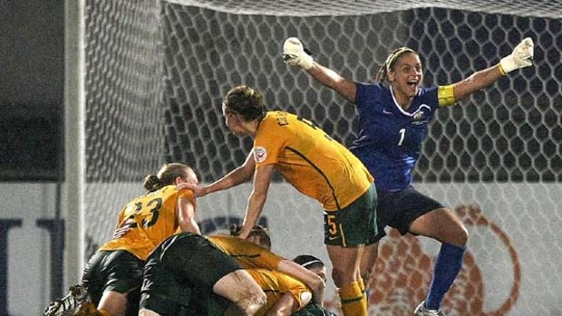 The Matildas celebrate after beating North Korea in a tense  penalty shoot-out.