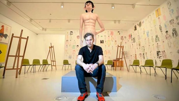 David Shrigley next to his life model of a urinating boy.