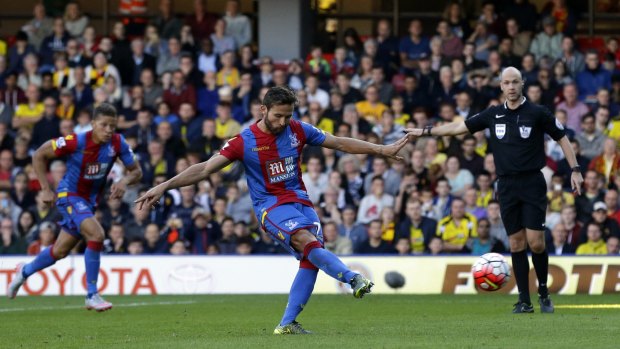 Crystal Palace's Yohan Cabaye scores the decisive penalty at Vicarage Road on Sunday.