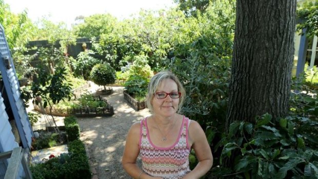 Gardener Kim Roberts in her garden in Malvern East. 