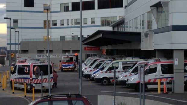 Ramped up ... Ambulances sit idle at the Austin Hospital on Monday night.