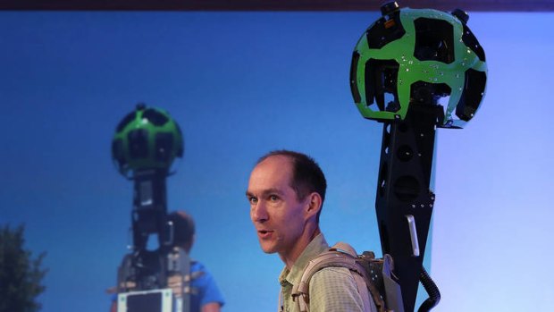 Privacy concerns ... Luc Vincent, Google Engineering Director for Street View, demonstrates a backpack camera called Trekker during a news conference about Google.