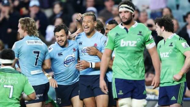 All smiles: Israel Folau, the Waratahs and Australian rugby are flying.