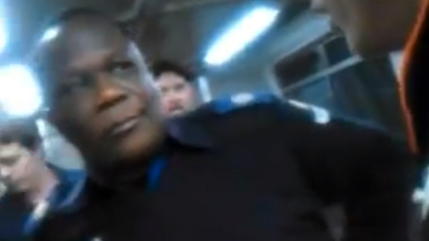 A screenshot from the video of a racist rant against a Queensland rail guard, pictured.