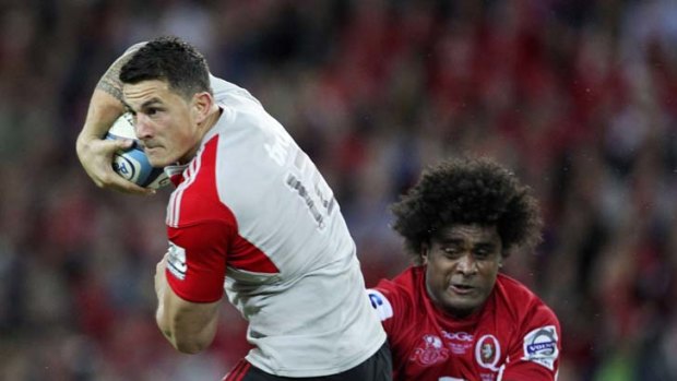 Back in business &#8230; Radike Samo tackles Crusaders star Sonny Bill Williams in the Super Rugby final. Samo has been called into the Wallabies squad after a seven-year absence.
