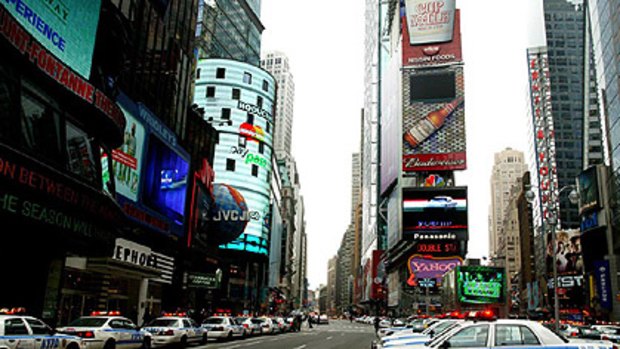 Huge screens light up Manhattan's Times Square.