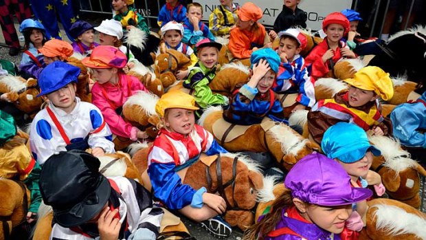 Children show off their true colours during the parade.