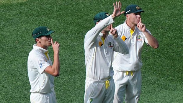 Australian players hush the Barmy Army after Mitchell Johnson dismissed Jonny Bairstow during this Boxing Day Test at the MCG.