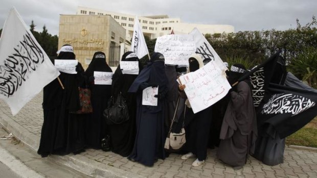 Protesters demand the release of Aafia Siddiqui in Tunis in 2012.