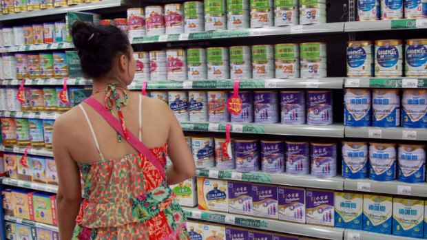 White gold rush: A customer browses the baby formula shelves in a Supermarket in China.