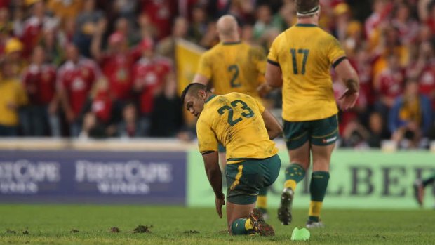 Unlucky: Kurtley Beale  looks back after slipping taking a penalty.
