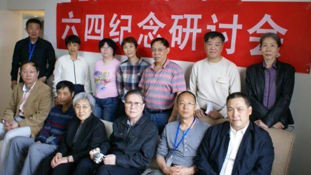 Tiananmen remembered: dissidents including lawyer Pu Zhiqiang (front row, first right) and scholar Xu Youyu (front row, second from left) attend a May 3 discussion of the Tiananmen Square pro-democracy protests. Mr Xu and Mr Pu were among five people arrested in connection with this meeting.
