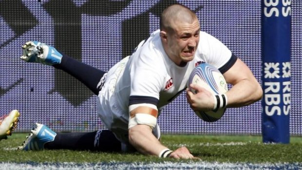 Try-scoring spree: England's Mike Brown crosses the line against Italy.
