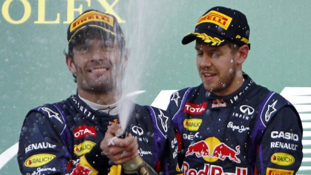 Red Bull drivers Mark Webber and Sebastian Vettel celebrate their one-two finish in Japan.