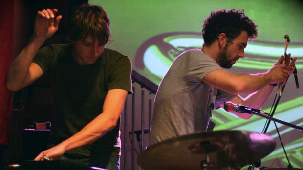 Daniel Holdsworth and Aidan Roberts at work on <i>Tubular Bells</i>.