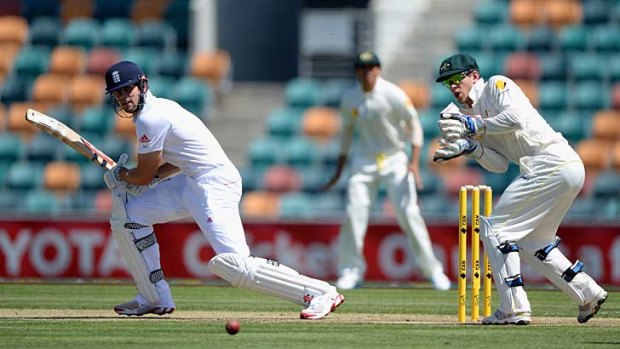 England captain Alastair Cook strokes a delivery towards the covers during his unbeaten century on day one of the tour match against Australia A.