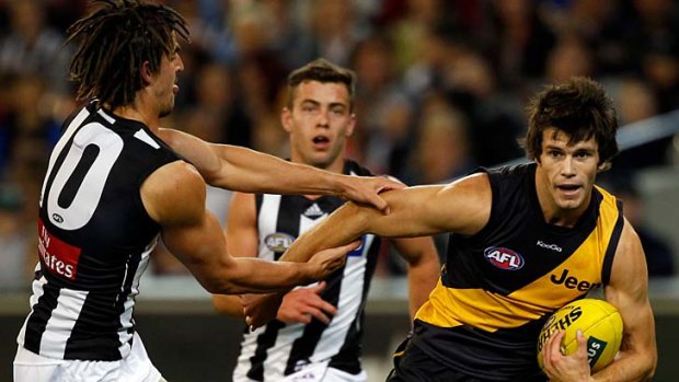 Unstoppable forces? Scott Pendlebury and Trent Cotchin.