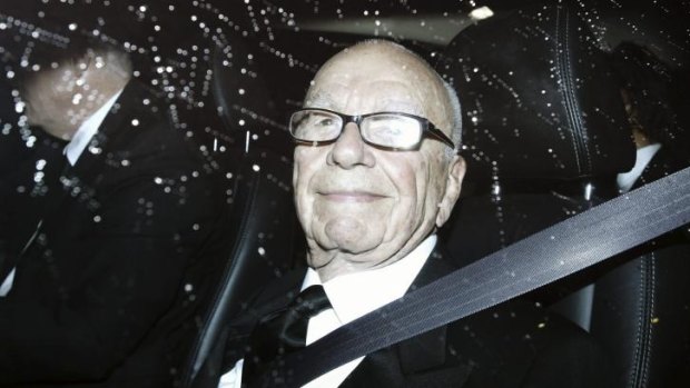 Rupert Murdoch arrived in his Ford Territory.