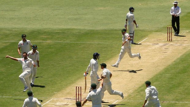 Australia celebrates the wicket of Ishant Sharma at the WACA.