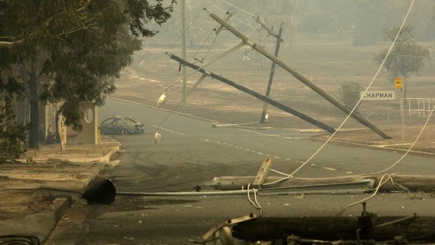 The aftermath of the 2003 bushfires in Darwinia Terrace, Chapman.