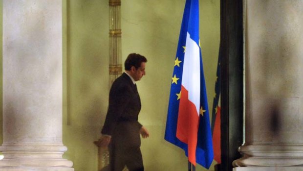 Downtrodden ... the French President, Nicolas Sarkozy, after a meeting with the French Finance Minister, Francois Baroin.