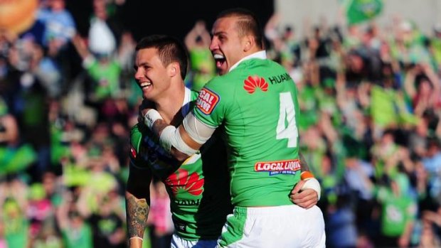 Canberra Raiders player, Sandor Earl celebrates with Blake Ferguson after scoring his second try.