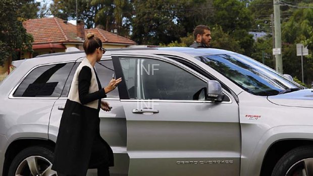 Car loan: Jesinta Campbell and Buddy Franklin getting into Karl Stefanovic's car.