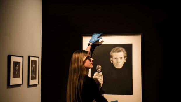 Curator Isobel Parker Philip with one of Mapplethorpe's final self-portraits.