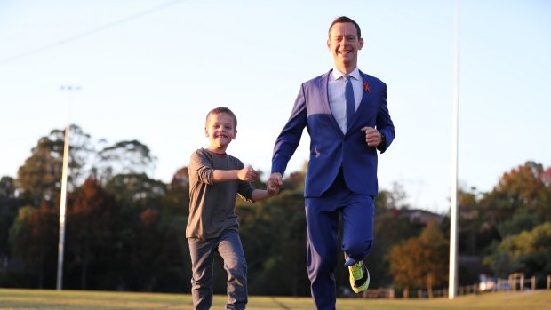 Michael Tozer trains with his son, Josiah for the City2Surf. He hopes to be the first contestant to cross the line in a costume.