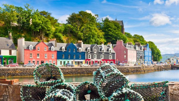 Colourful houses of Tobermory harbour and lobster pots