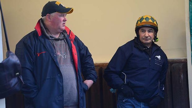 Foreman Reg Fleming and trackwork rider Joe Agresta are coming to terms with a move.