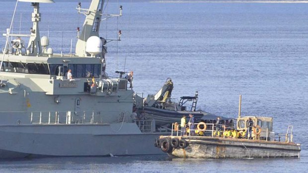 The navy intercepts a boat full of asylum seekers: Australia has been found guilty of violating the human rights of 46 refugees.
