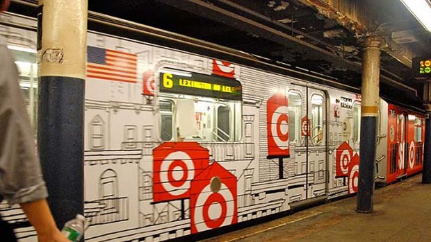 American graffiti ...  a train wrapped in advertising in New York.