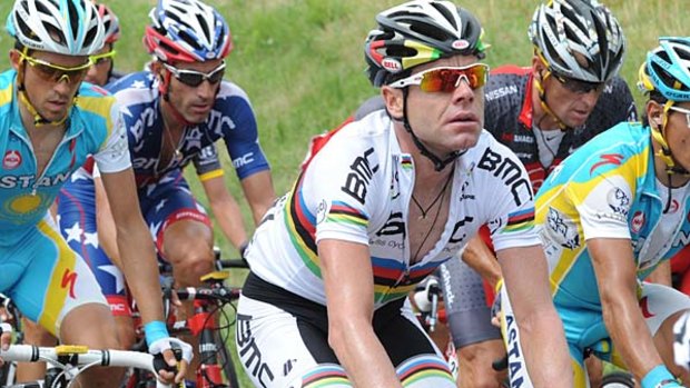 Spain's Alberto Contador (L) rides with Australia's Cadel Evans (C) and US George Hincapie (2ndL).