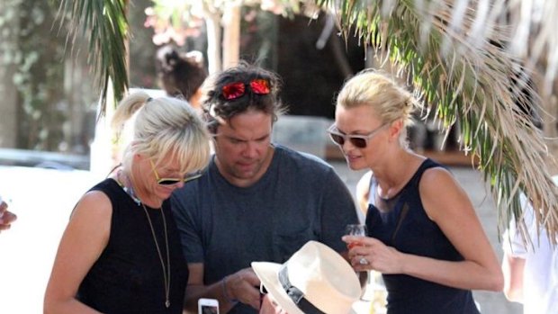 Getting closer: Elisabeth, Lachlan, Sarah and James Murdoch in Mykonos.