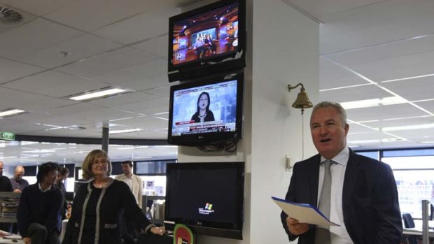 Edited out &#8230; Peter Fray addresses staff in the Herald newsroom yesterday, watched by Amanda Wilson.